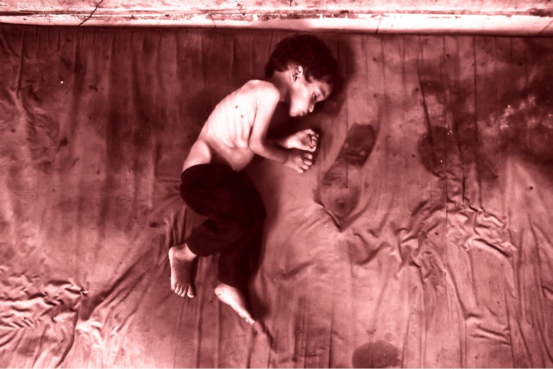 Palestinian refugees holding pots and waiting for food in Gaza